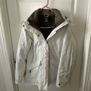 New without tags Woman’s North face jacket with removable fleece jacket inside.